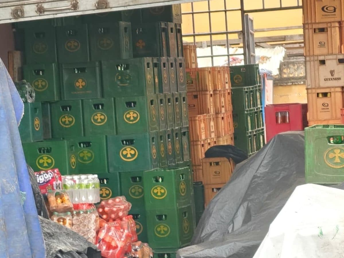 Beer crates and packs stored inside the depot