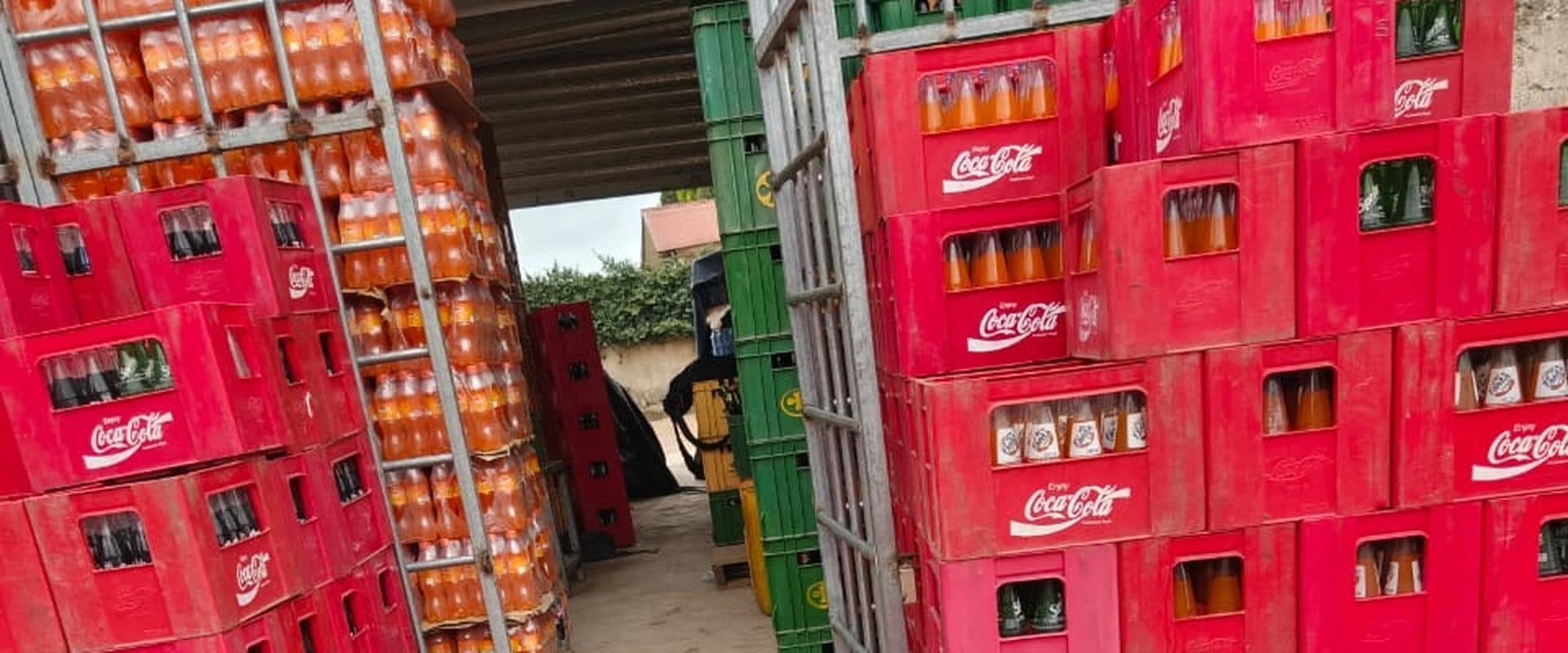 Pallets of Coca-Cola crates ready for dispatch