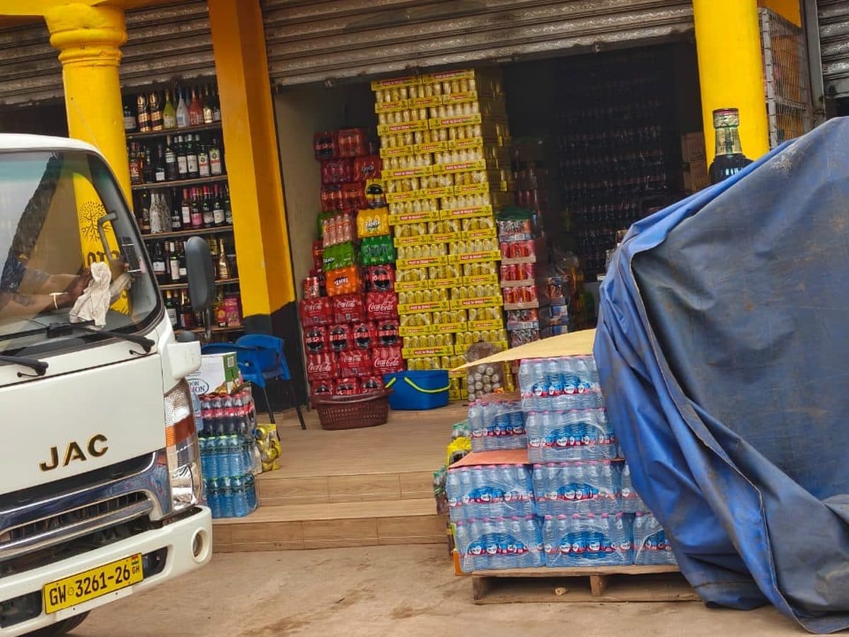 Minerals, water and spirits stacked at the front of the shop